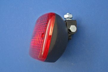 Rear fog lamp mounted on an adjustable steel bracket