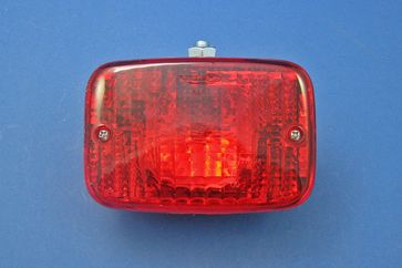 Rear fog lamp mounted on an adjustable steel bracket