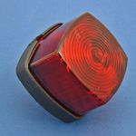 Tail lamp - rubber-mounted black plastic base with red lens thumbnail