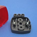 Tail lamp - rubber-mounted black plastic base with red lens thumbnail